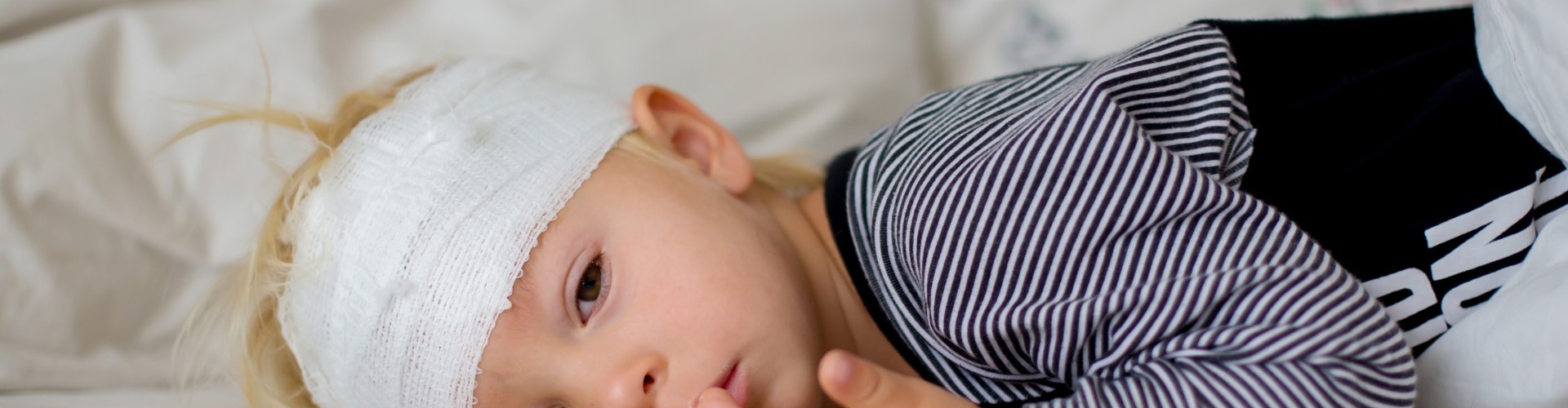 Rough or inappropriate handling of an infant